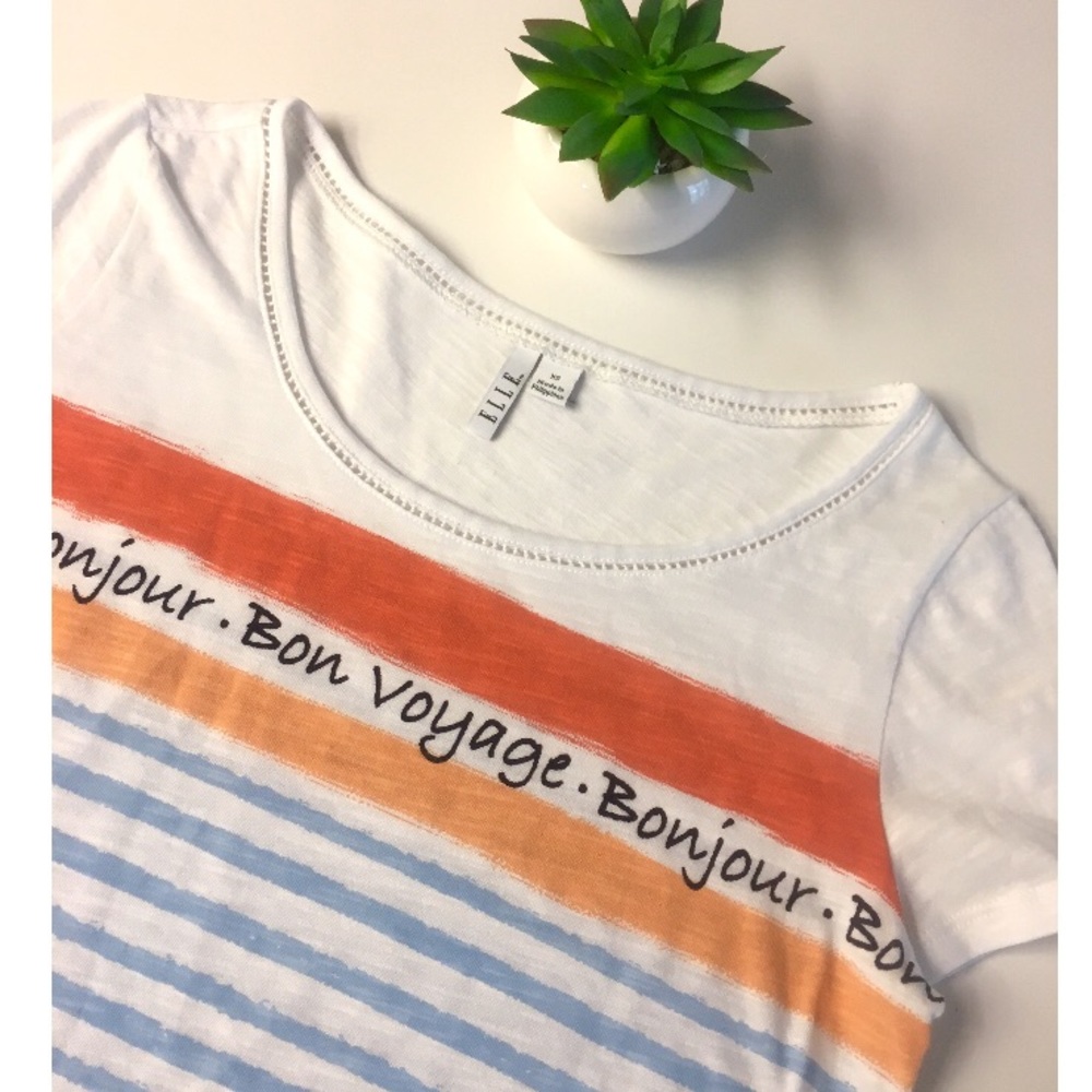 Elle “Bon Voyage” Short Sleeve Top!